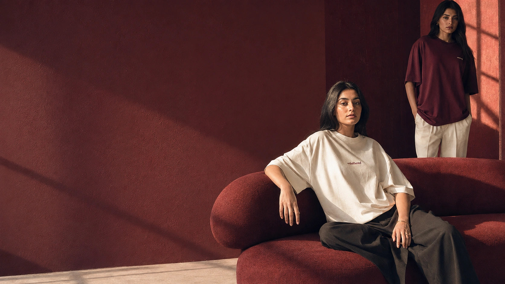 The personal edition: oversized cream and oxblood tees, styled with attitude